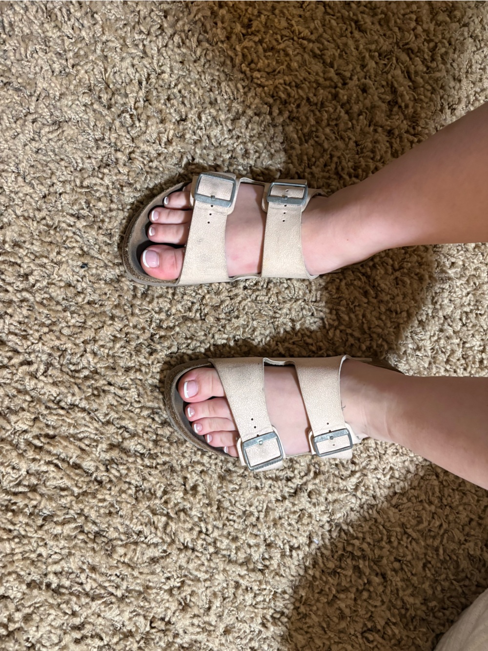 Well worn Birkenstock Women's Double Buckle Slides in Light Beige